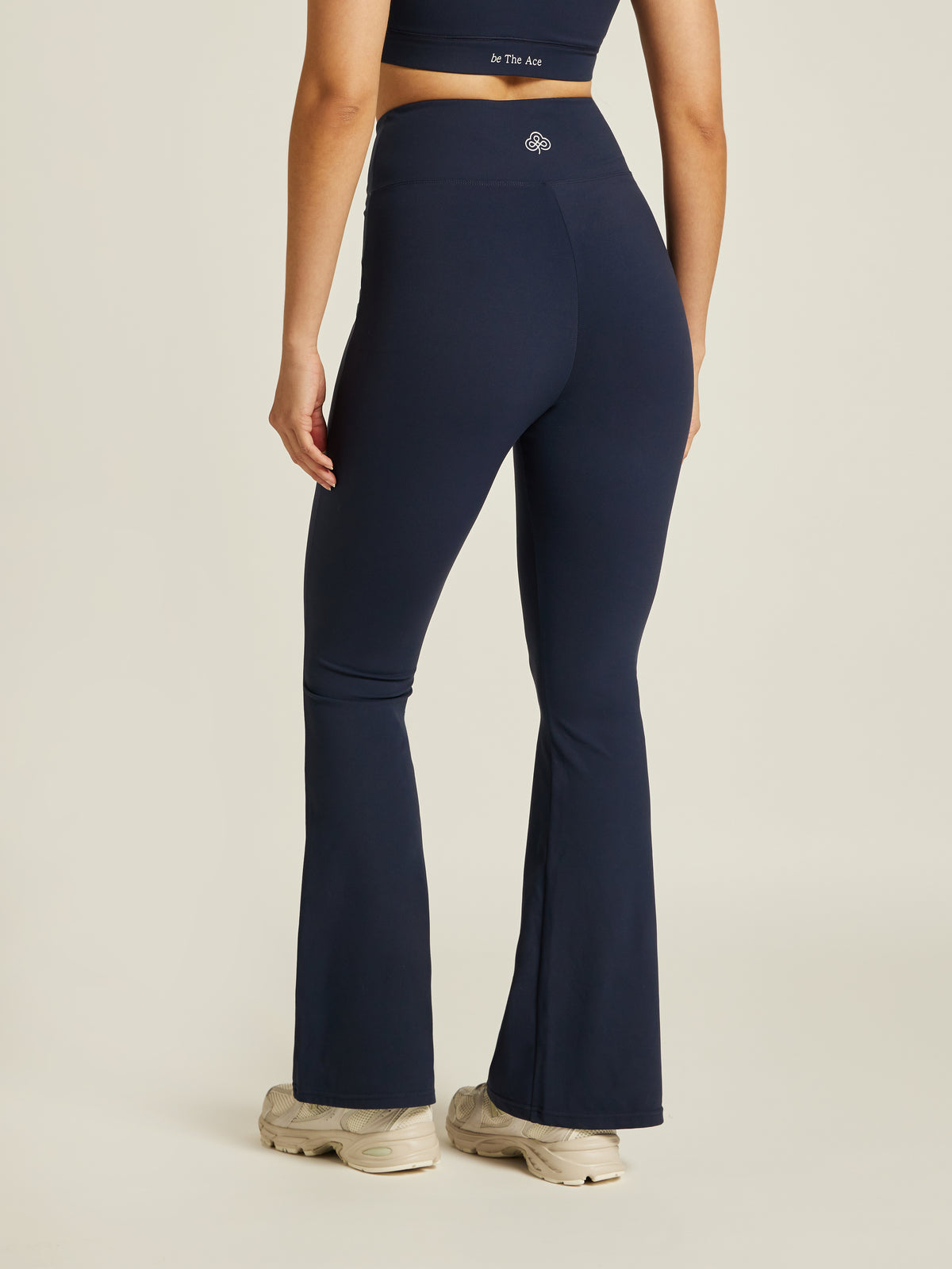 Be 180 Wrap-Waist Flared Leggings - Midnight | Beathletica Activewear