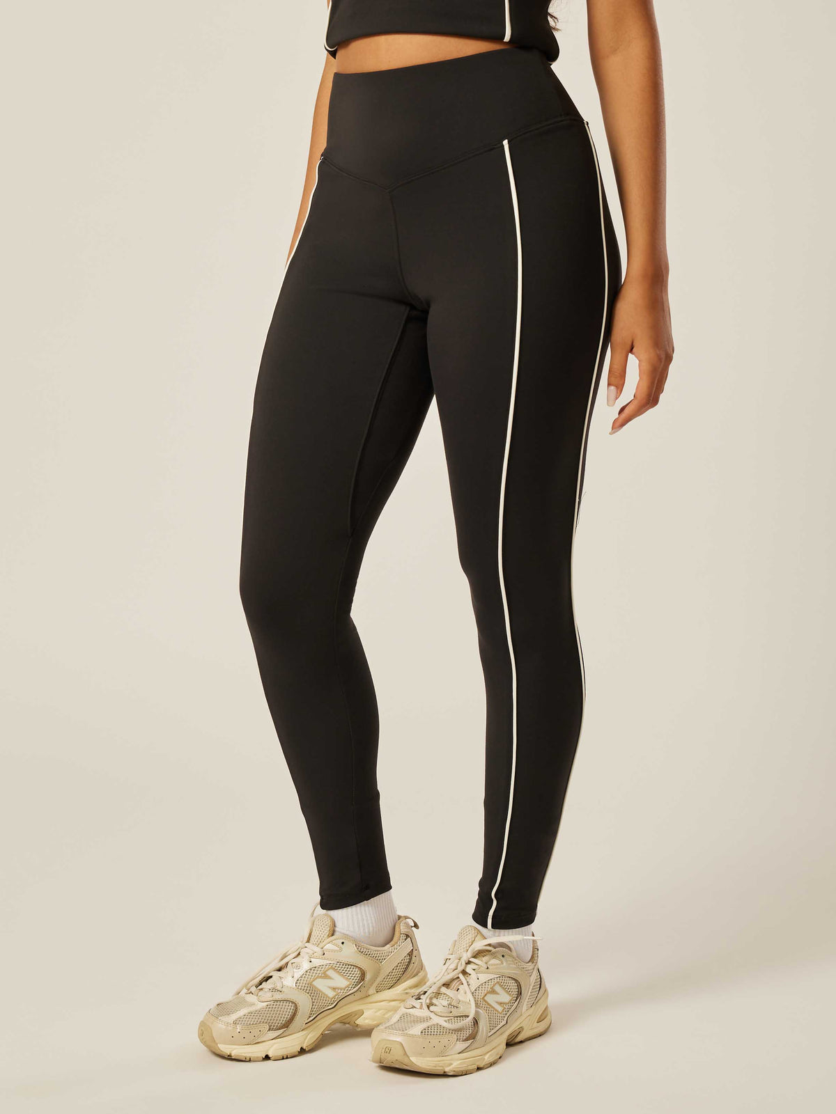 Core Flexibility Piped Leggings - Black | Beathletica Activewear