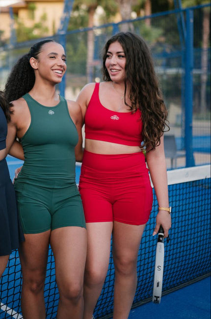 Girl in Be Athletica Red Sports Bra on Padel Court